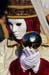 A white mask handing a reflecting sphere - Masks at the Venice Carnival, JBLArts photography
