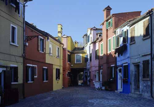 A triangular court of coloured houses in Burano - Burano in Venice, JBLArts photography