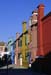 A foreshortened view of Burano's coloured terrace houses with chimneys - Burano in Venice, JBLArts photography